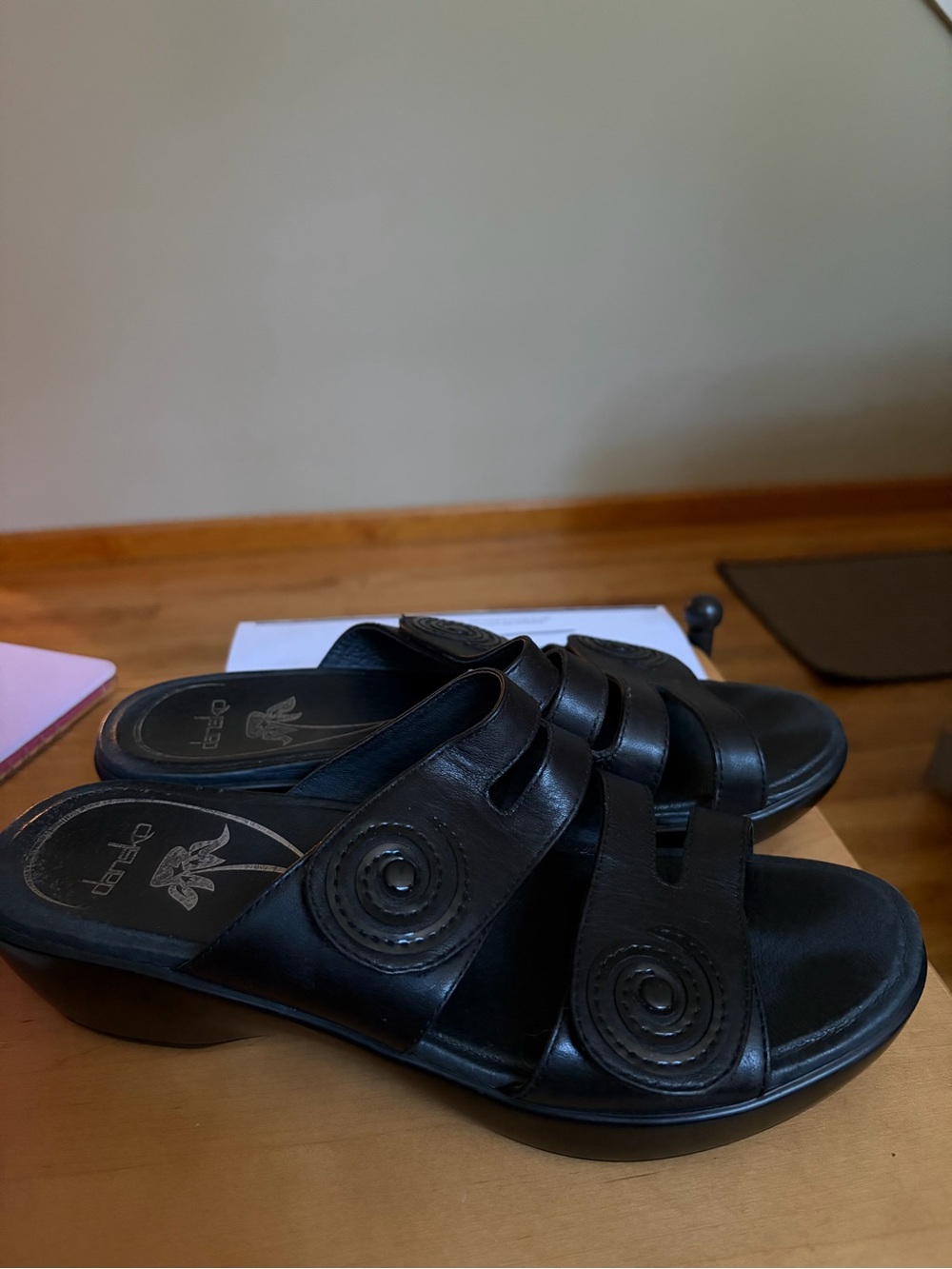 Women's Black Leather Slip-On Mules with Decorative Circular Accents
